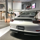Illustration for article titled This Couple Topped Your Wildest Dreams By Getting Married In A Porsche Showroom